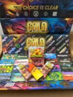 gold coast clear 2g authentic disposable vape pen unboxed with retail packaging display