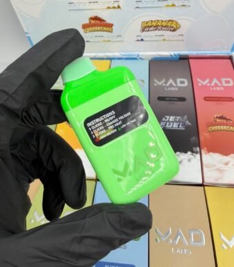 Mad Labs 2g Disposable Hero Banner Highlighting Gold Edition Hardware and USB-C Charging Base