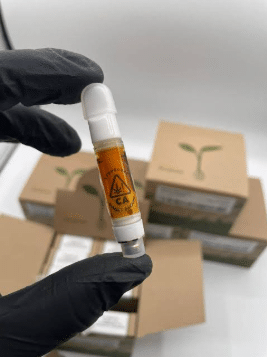 Raw Garden Sauce Cart authentic 510 all-ceramic live sauce cartridge unboxed with black label packaging display