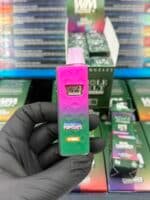 Whole Melt v7 authentic live diamond disposable vape pen unboxed with retail packaging display