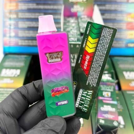 Whole Melt v5 authentic live diamond disposable vape pen unboxed with retail packaging display