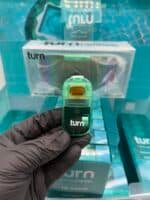 Turn Retrovision 2G Disposable authentic all-in-one vape pen unboxed with retail packaging display